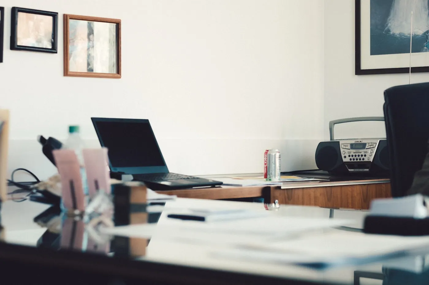 Professional consultant workspace with laptop and documents